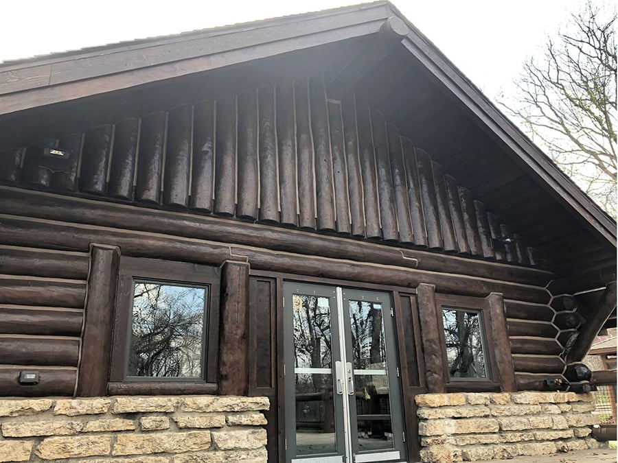 The glass front doors of the updated building.
