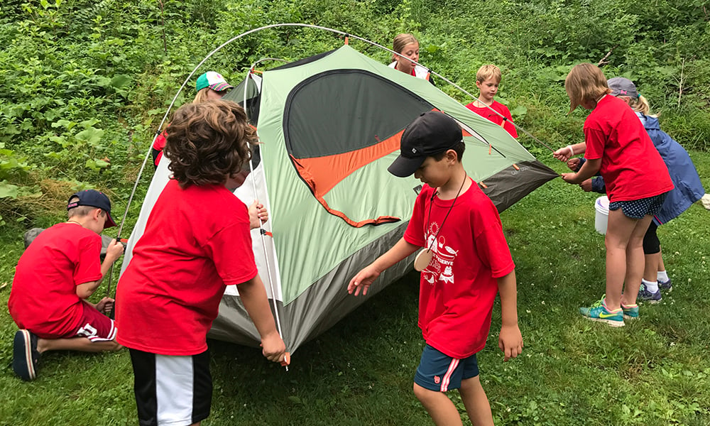 campers-set-up-tent