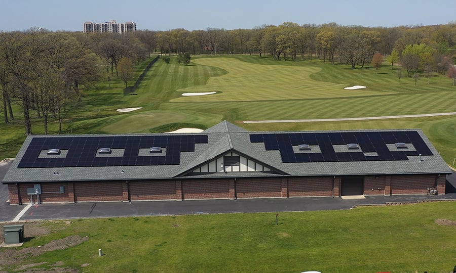 The cart barn at The Preserve at Oak Meadows with solar panels on the roof.