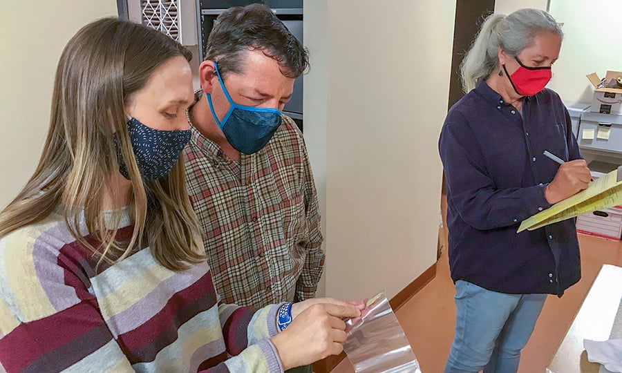 ISAS staff inspect and catalog items.