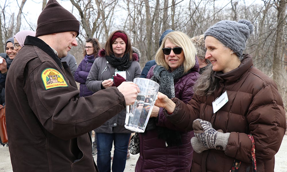 naturalist-dave-andrusyk-pours-sap