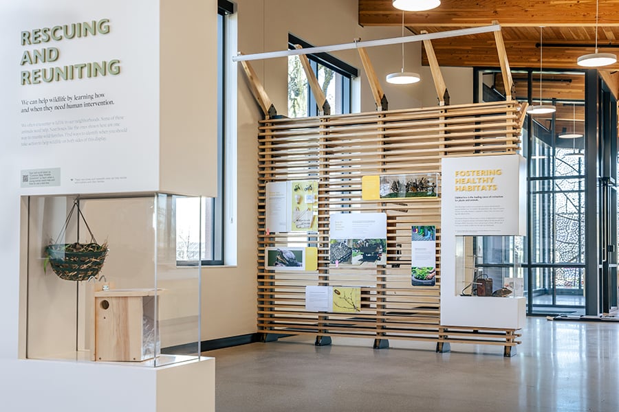 the interior of the visitor center showing exhibit panels