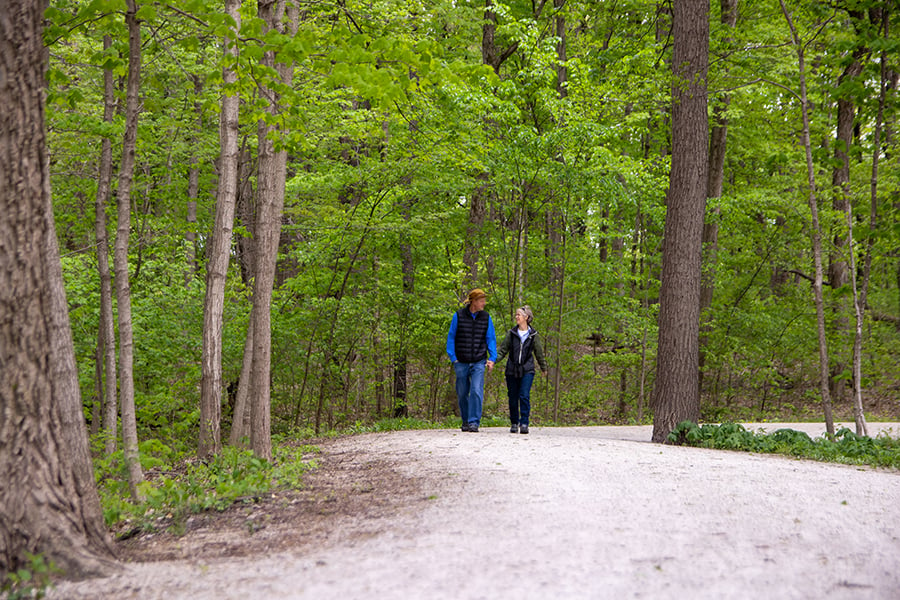 people walking on a trail at Warrenville Grove