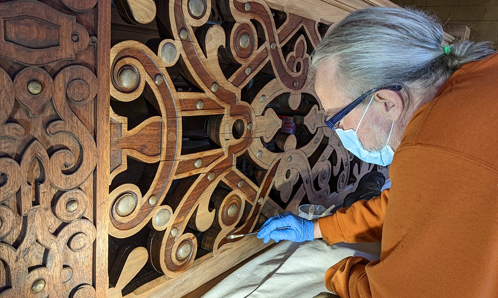 Mayslake Staircase person refinishing stairs