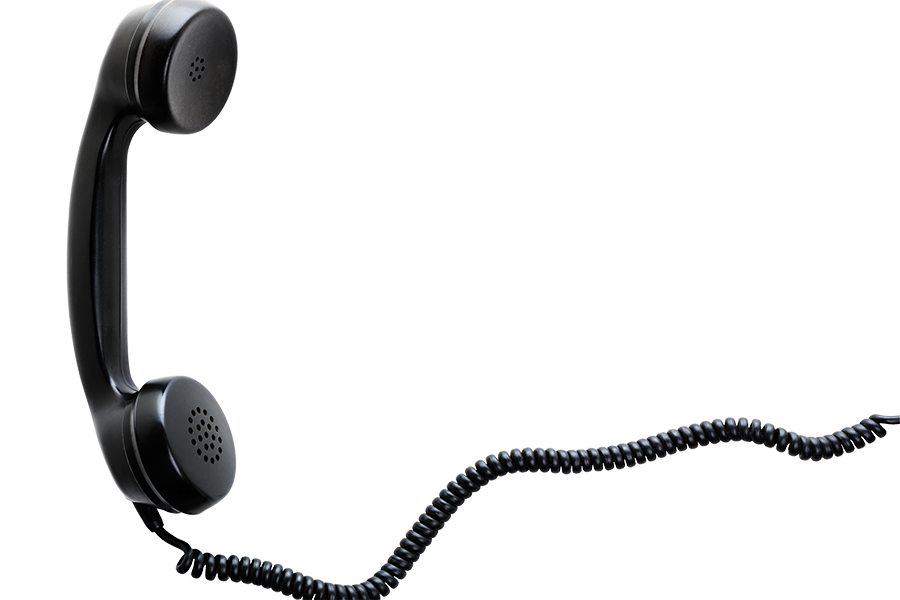 A black corded phone.