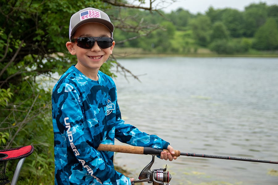 smiling-young-angler-900x600