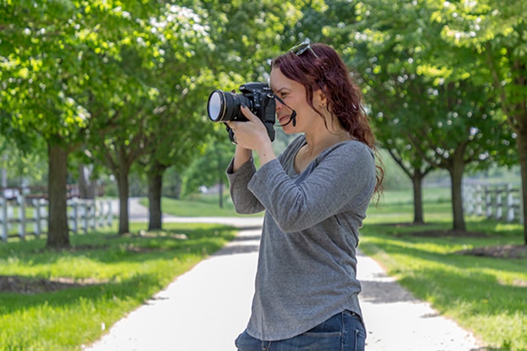 heidi-carpenter-holds-camera-feature
